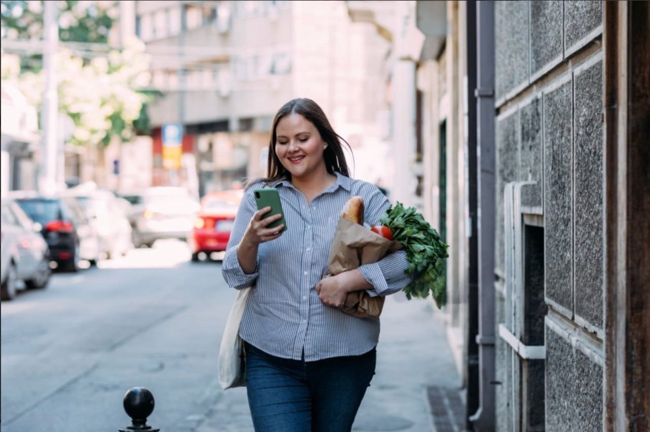 Woman walking and monitoring health
